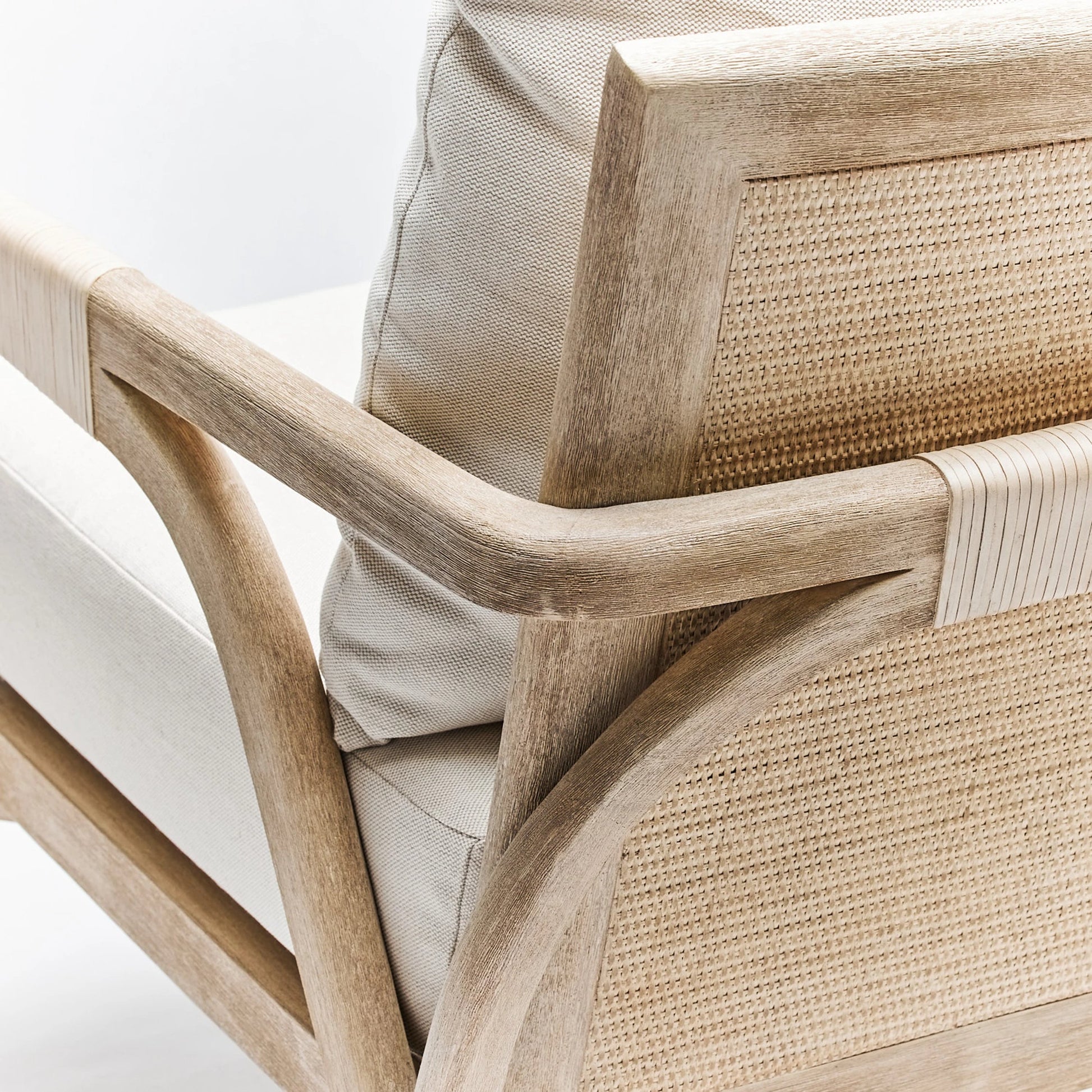 Delray Lounge Chair by Interlude Home. Made from mahogany, rattan, leather, flax weave in a modern style.