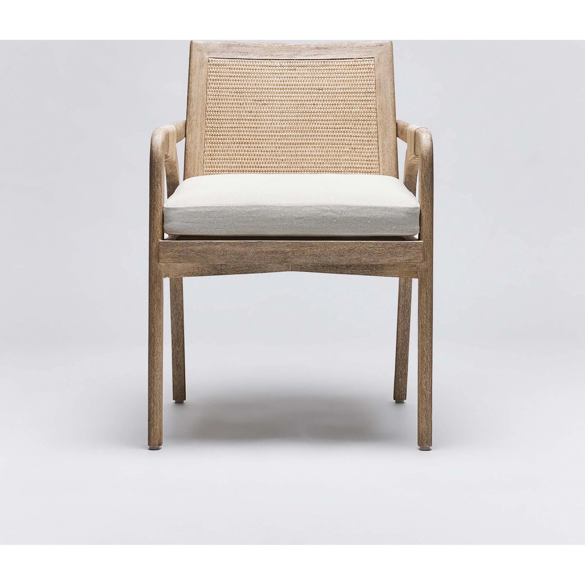 Delray Arm Chair by Interlude Home. Made from mahogany, rattan, leather, flax weave in a cottage & farmhouse style.
