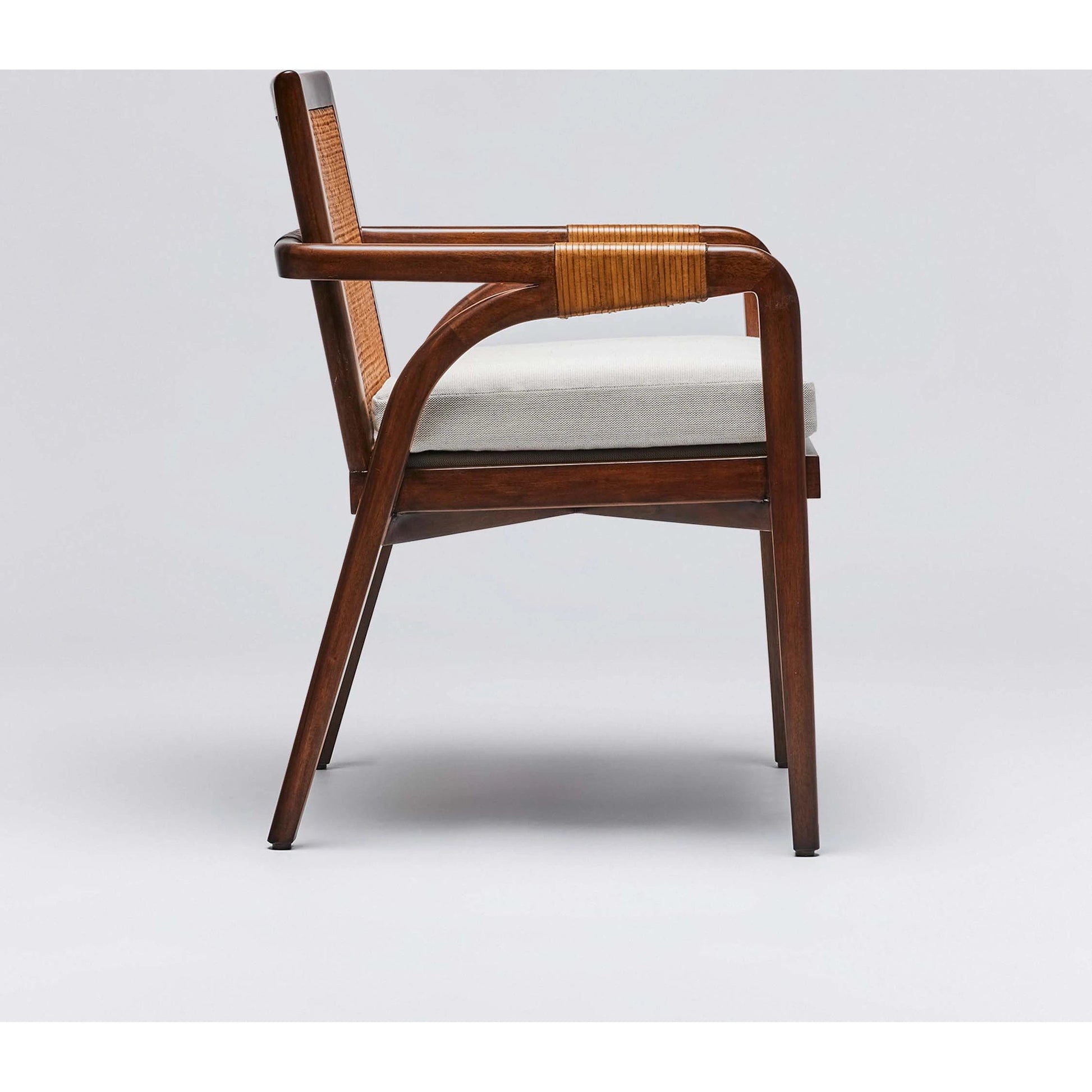 Delray Arm Chair by Interlude Home. Made from mahogany, rattan, leather, flax weave in a cottage & farmhouse style.