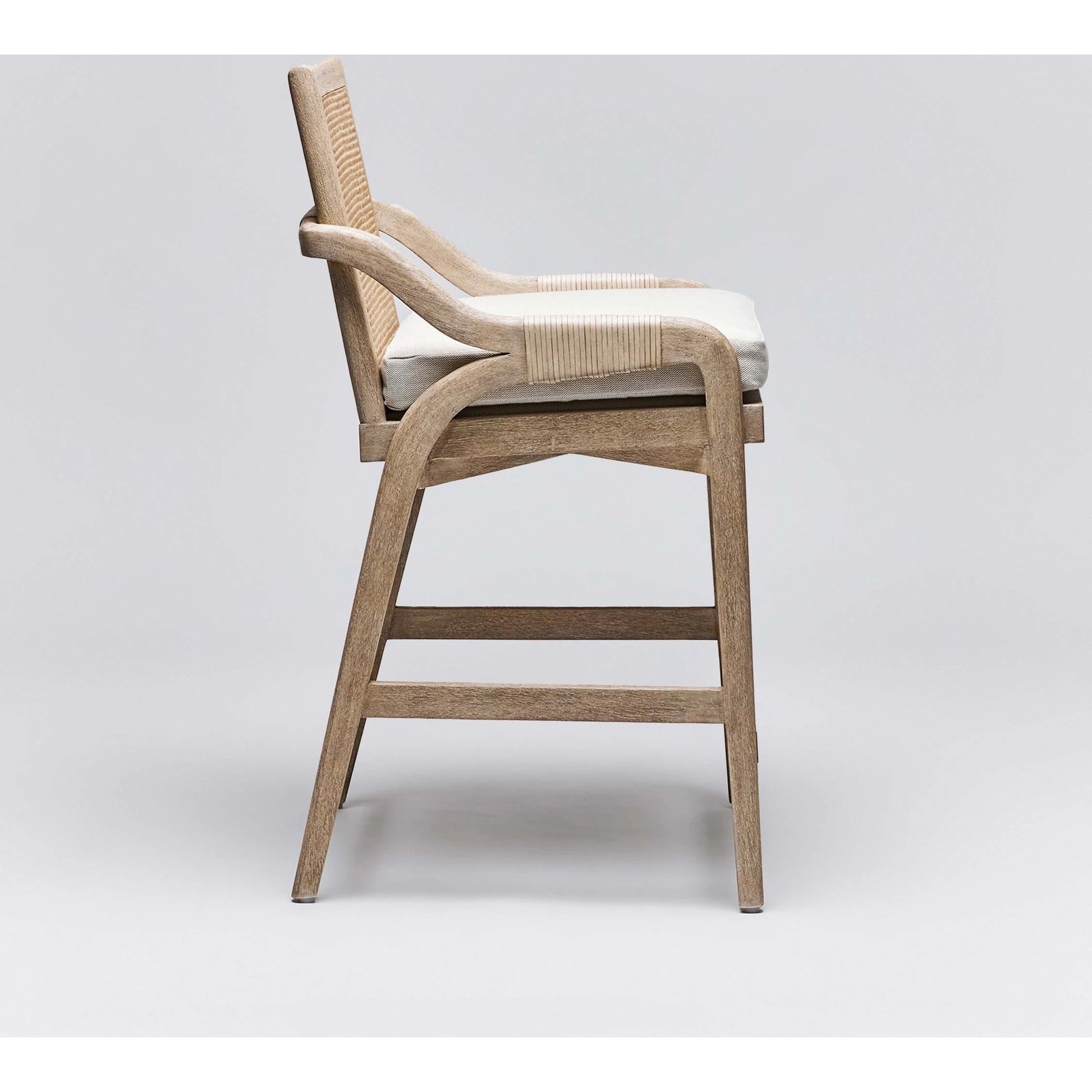 Delray Counter Stool by Interlude Home. Made from mahogany, rattan, leather, metal, flax weave in a cottage & farmhouse style.