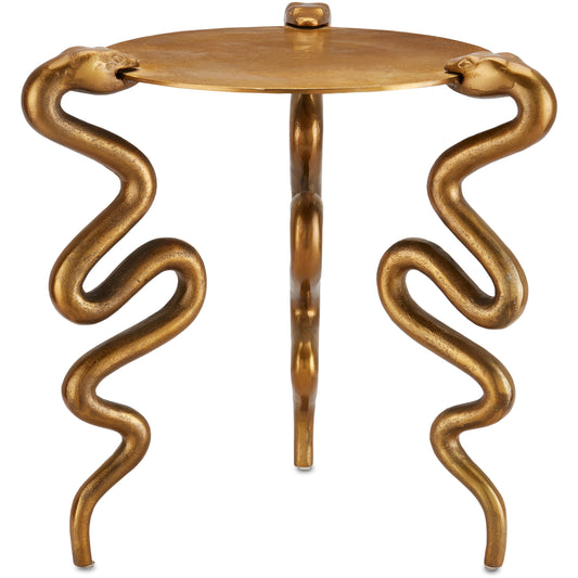 Serpent Accent Table by Currey and Company in antique brass. Made from cast aluminum in a modern style.