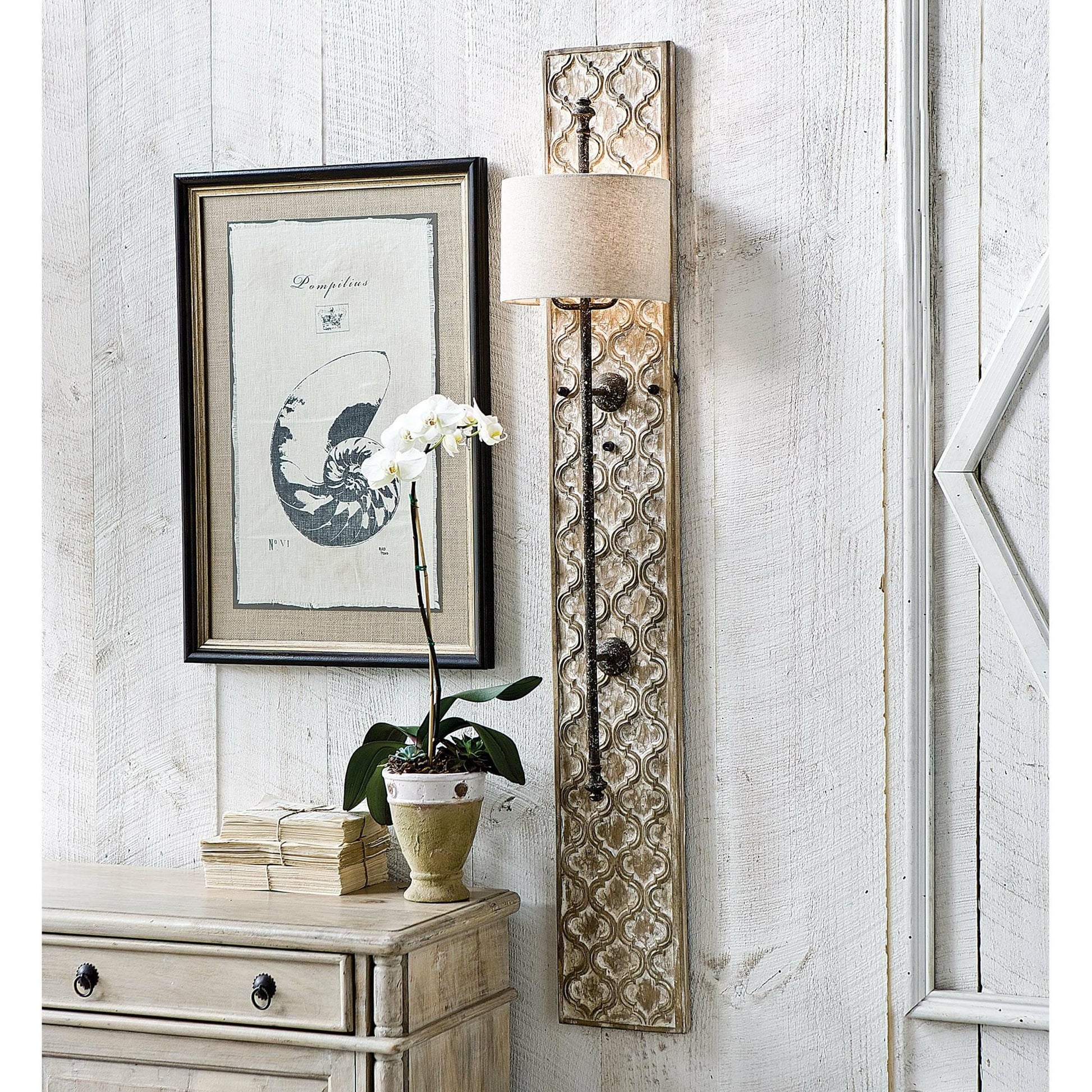 Carved Panel Sconce by Regina Andrew in distressed, painted and distressed painted. Made from paulownia wood in a cottage & farmhouse style.