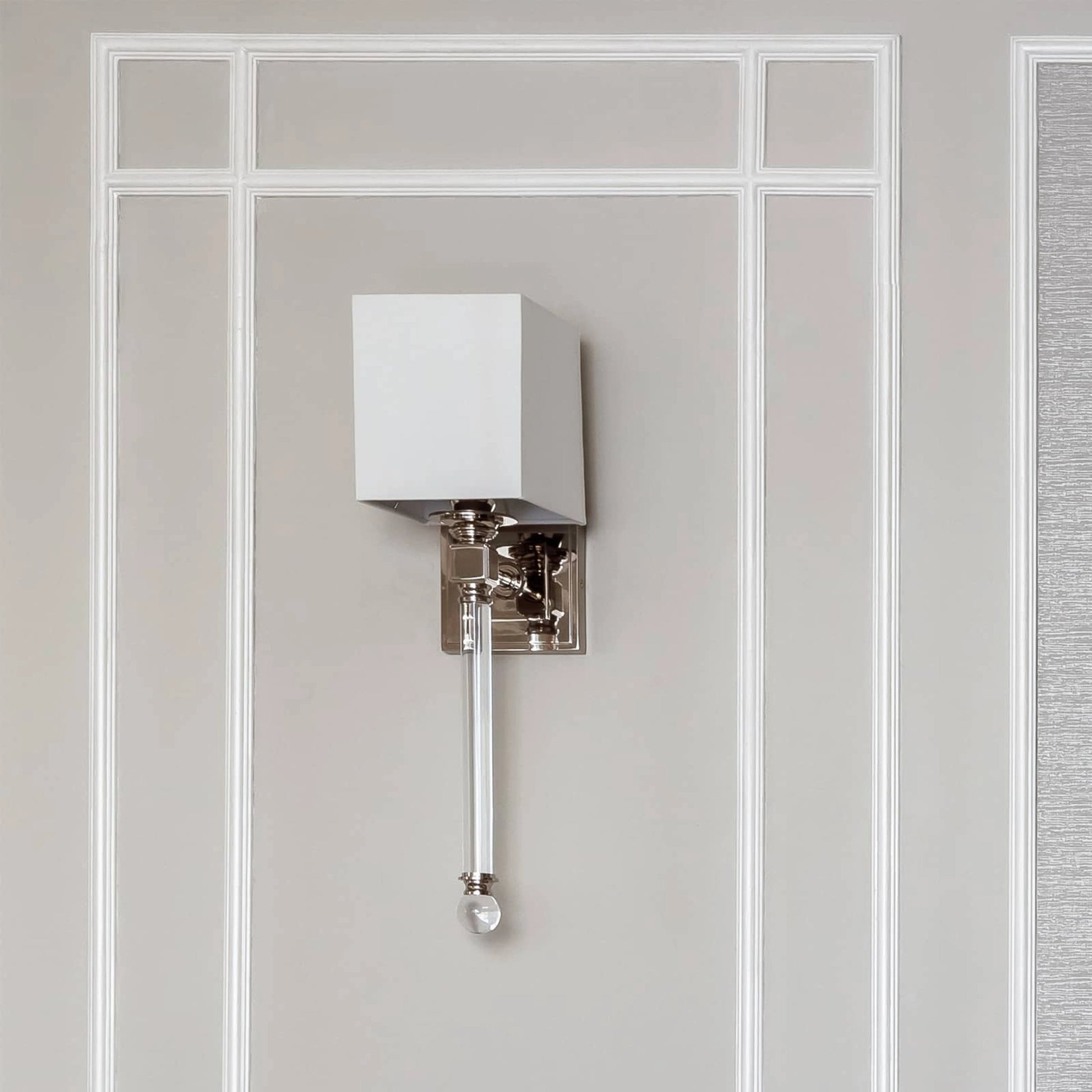 Crystal Tail Sconce by Regina Andrew in nickel and polished nickel. Made from steel in a transitional style.