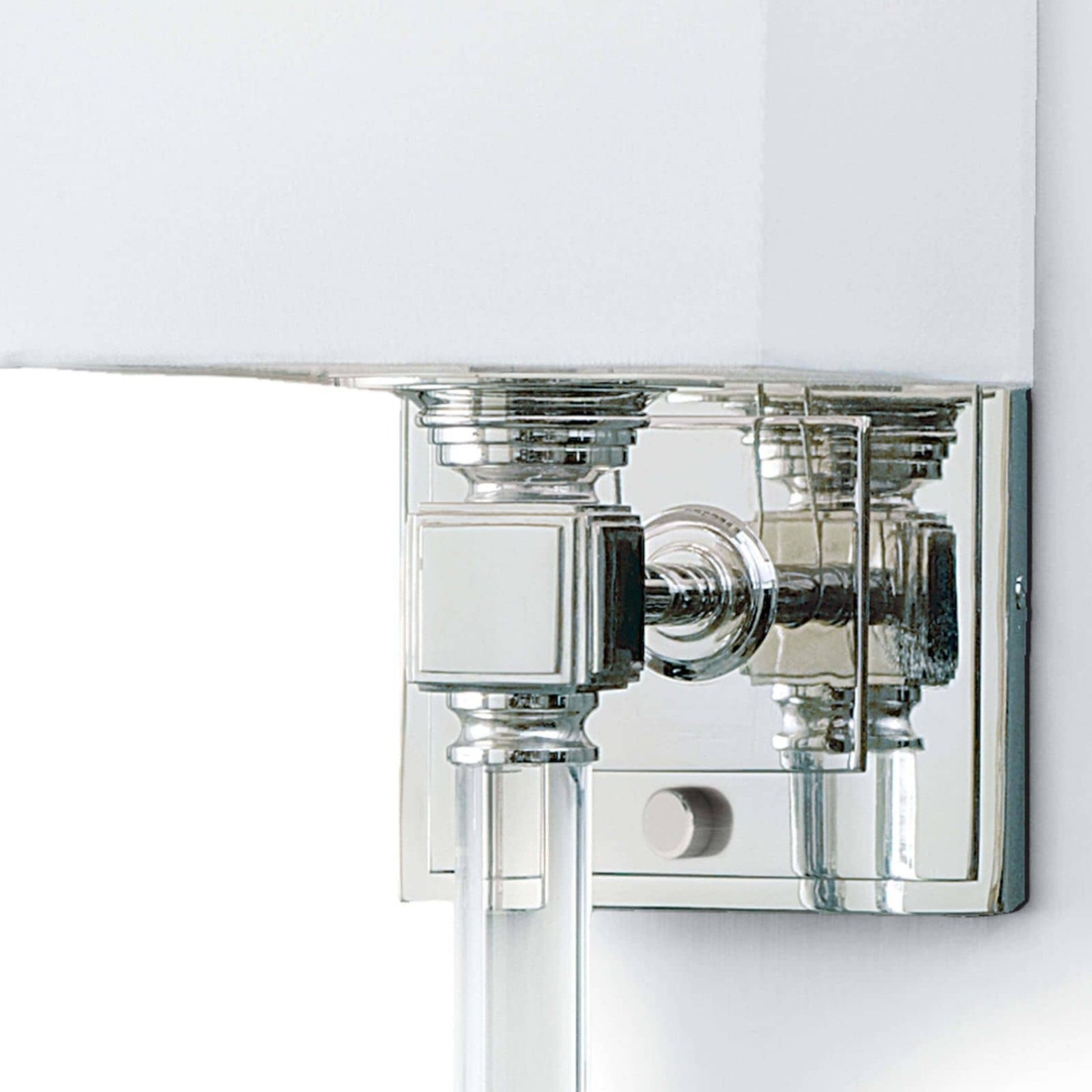 Crystal Tail Sconce by Regina Andrew in nickel and polished nickel. Made from steel in a transitional style.