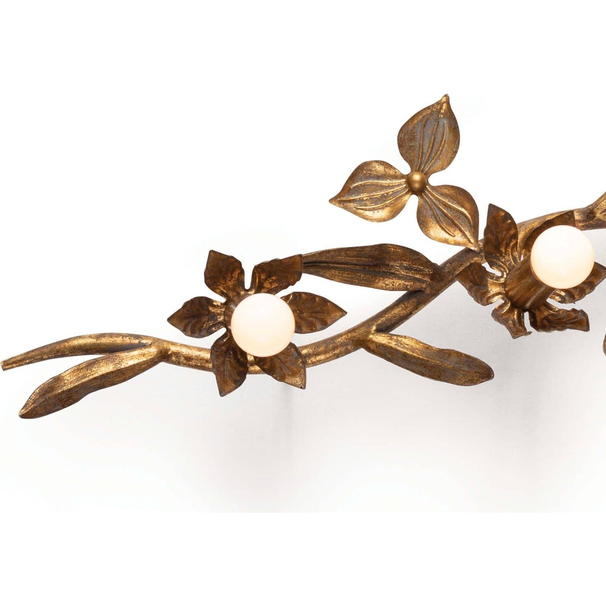 Trillium Sconce by Regina Andrew in brass and natural brass. Made from steel in a transitional style.