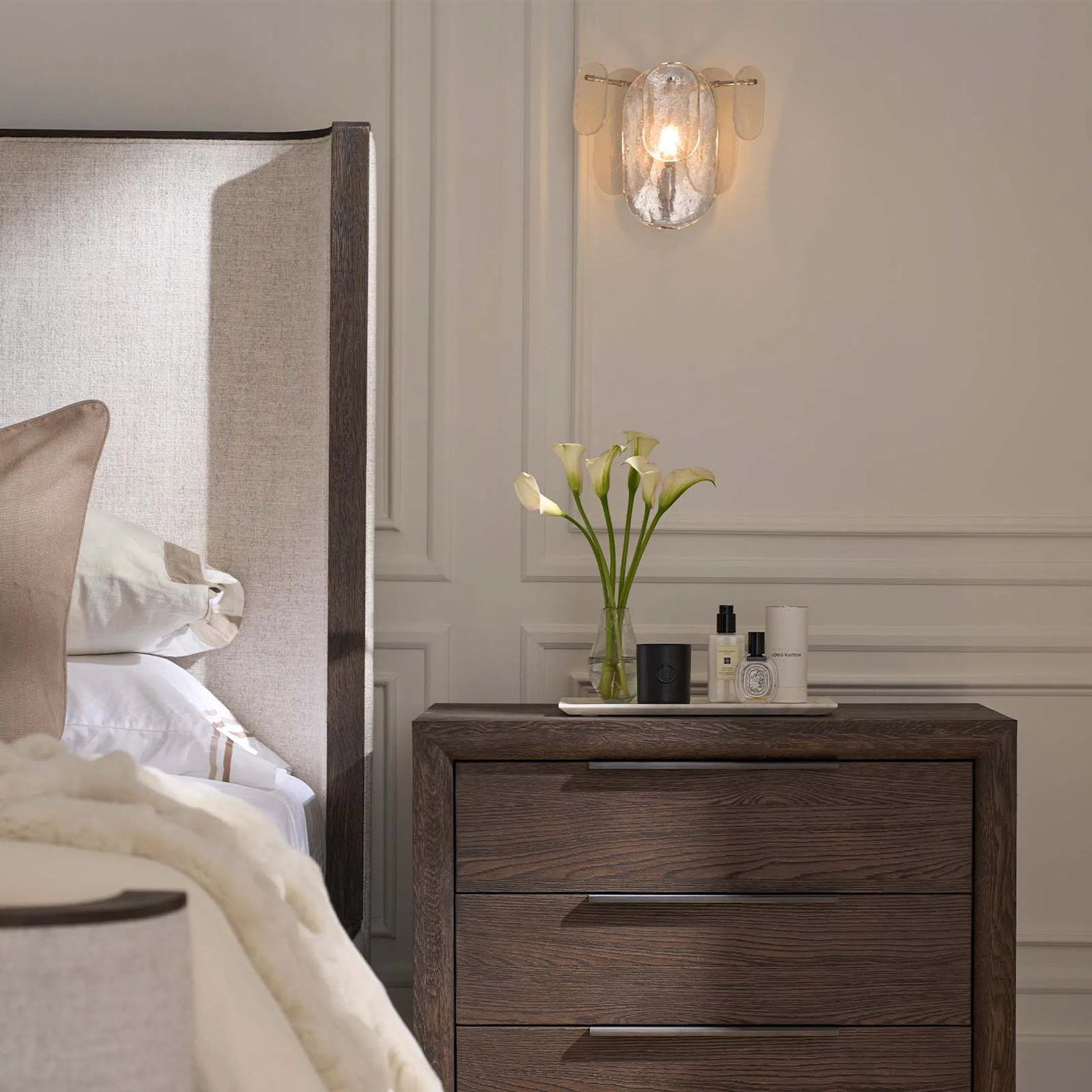 Echo Sconce by Regina Andrew. Made from glass in a modern style.
