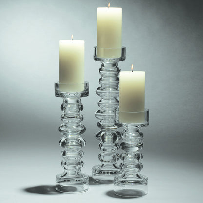 Glass Ribbed Candleholder by Global Views. Made from glass in a transitional style.