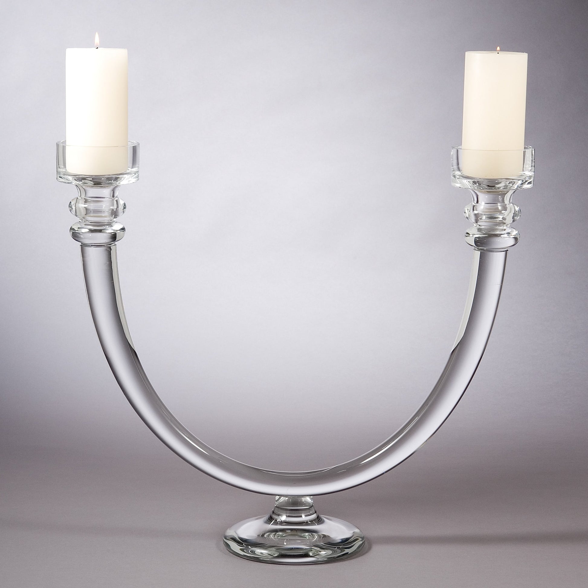 Two Lite Glass Tube Candelabra by Global Views. Made from glass in a transitional style.
