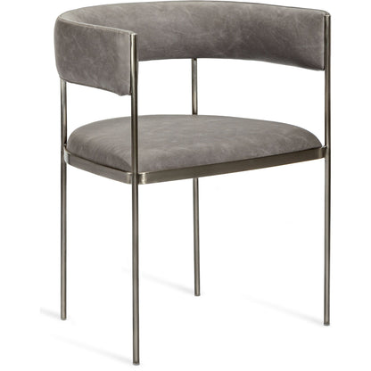Ryland Dining Chair by Interlude Home in distressed charcoal, antique bronze. Made from faux leather, metal in a modern style.