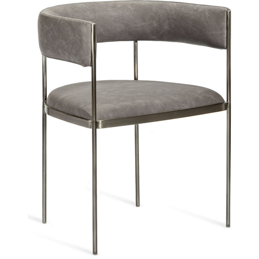 Ryland Dining Chair by Interlude Home. Made from faux leather, metal in a modern style.