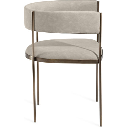 Ryland Dining Chair by Interlude Home in distressed charcoal, antique bronze. Made from faux leather, metal in a modern style.