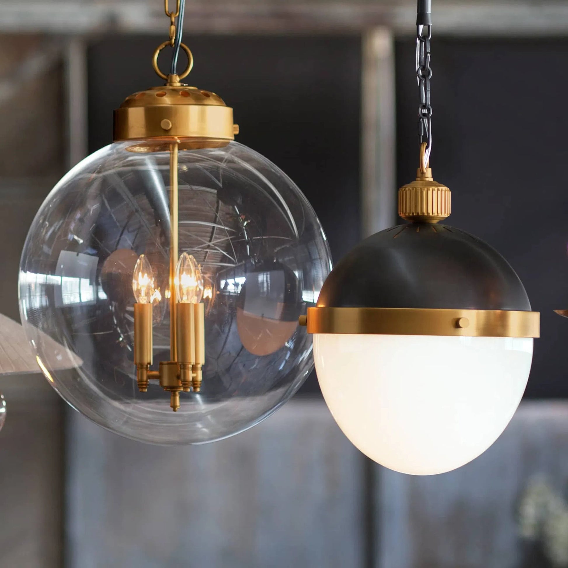 Globe Pendant in Natural Brass by Regina Andrew in brass and natural brass. Made from cast zinc in a traditional style.
