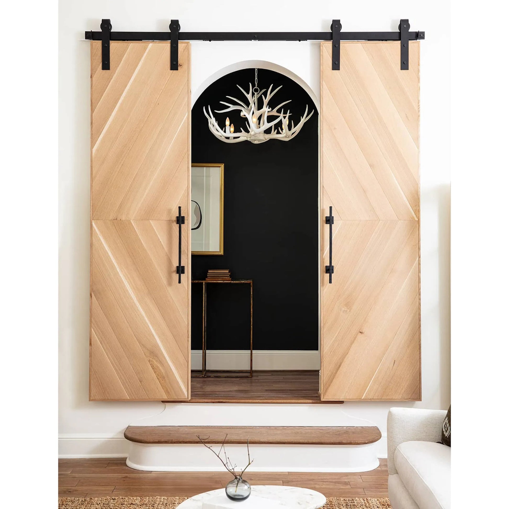 Antler Chandelier by Regina Andrew in silver leaf. Made from resin in a rustic style.