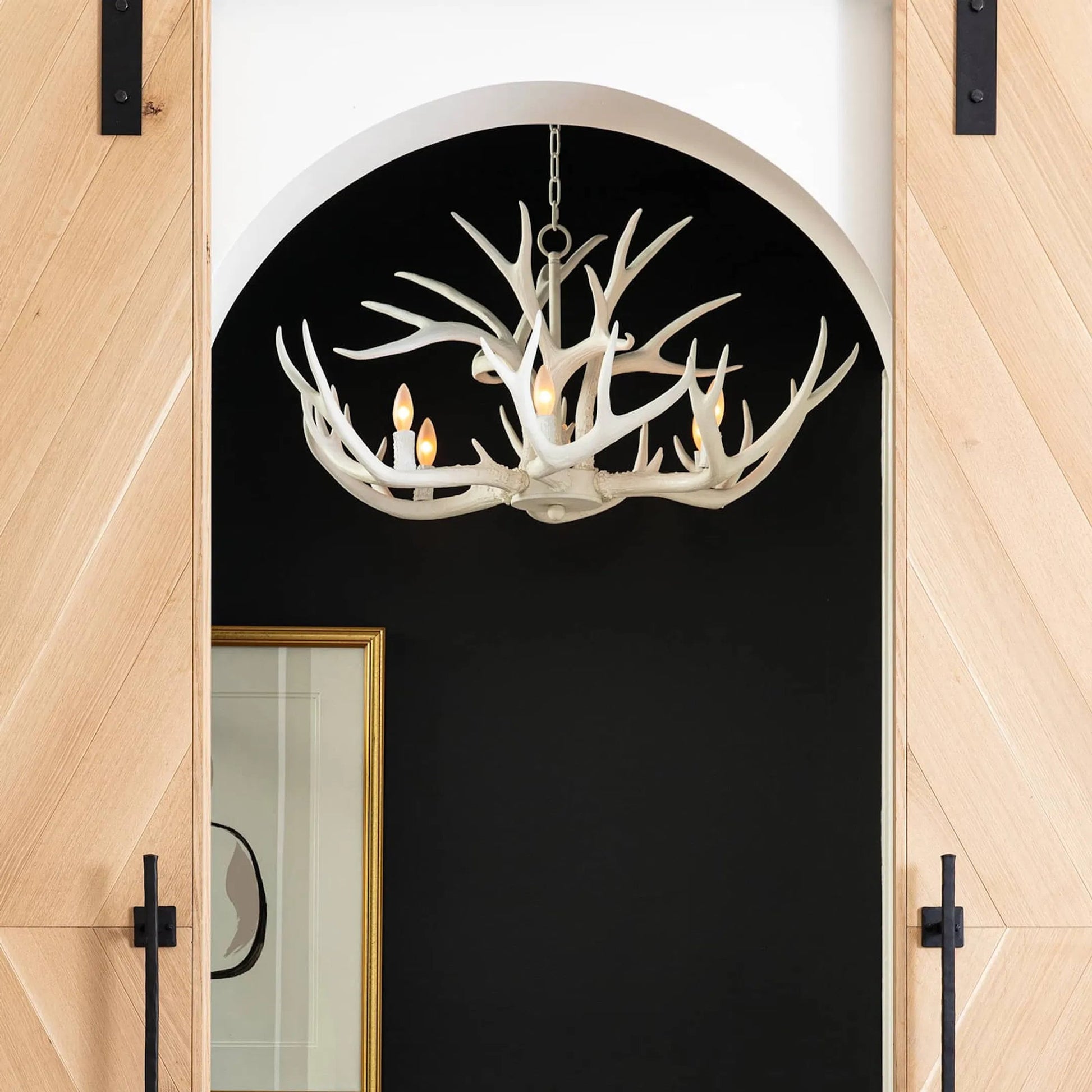 Antler Chandelier by Regina Andrew in silver leaf. Made from resin in a rustic style.
