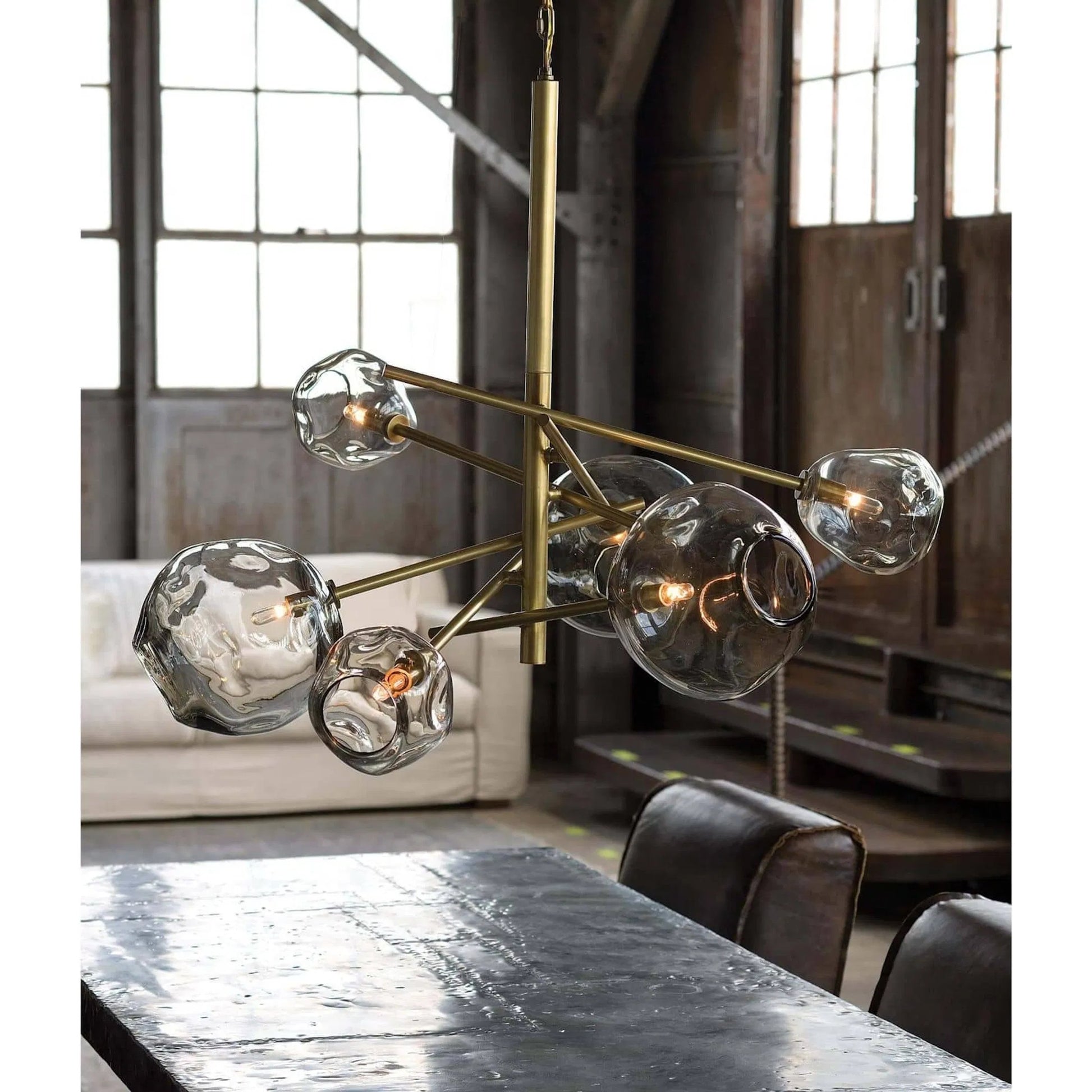 Molten Chandelier with Smoke Glass by Regina Andrew in nickel and polished nickel. Made from glass in a modern style.