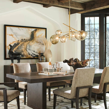 Molten Chandelier with Smoke Glass by Regina Andrew in nickel and polished nickel. Made from glass in a modern style.