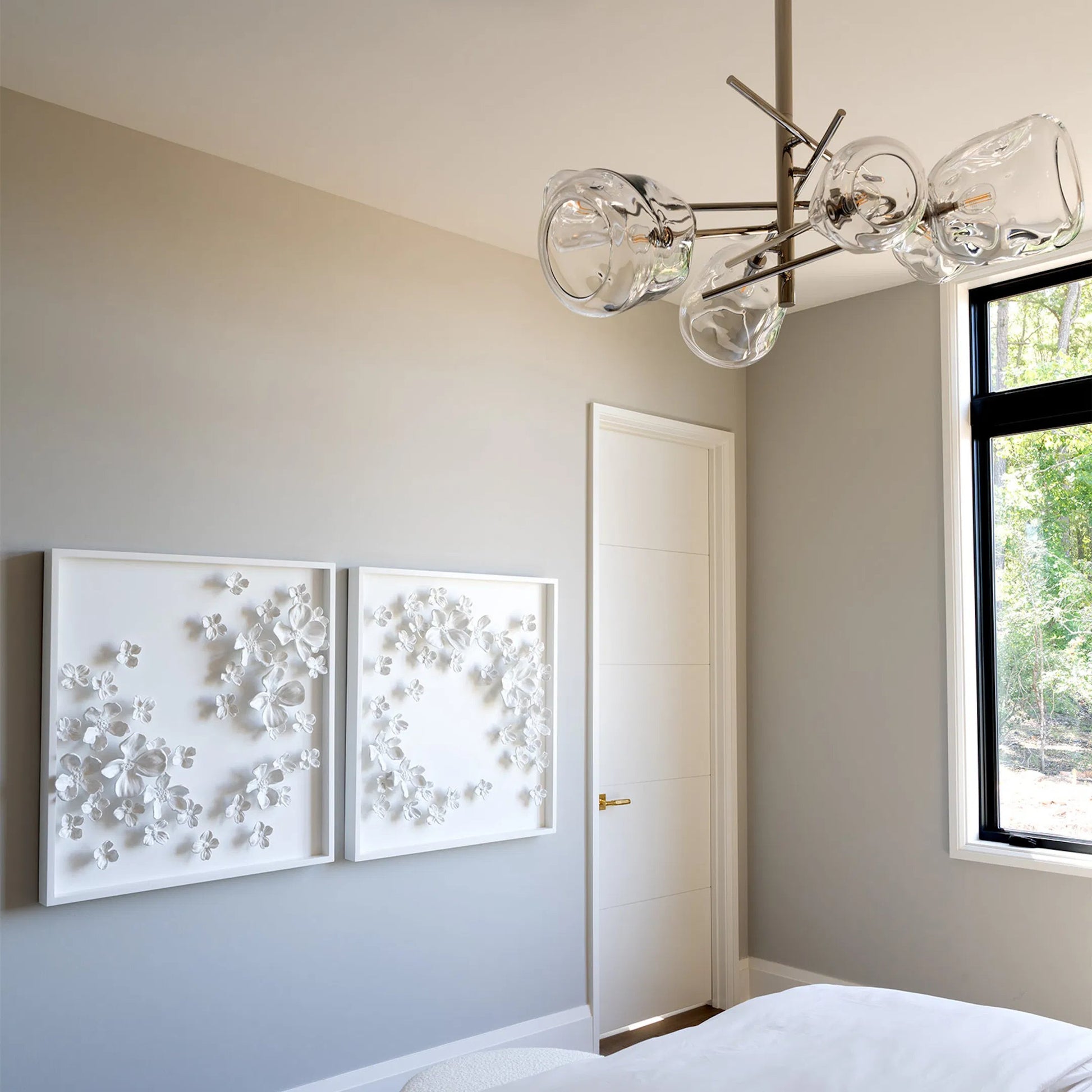 Molten Chandelier with Smoke Glass by Regina Andrew in nickel and polished nickel. Made from glass in a modern style.