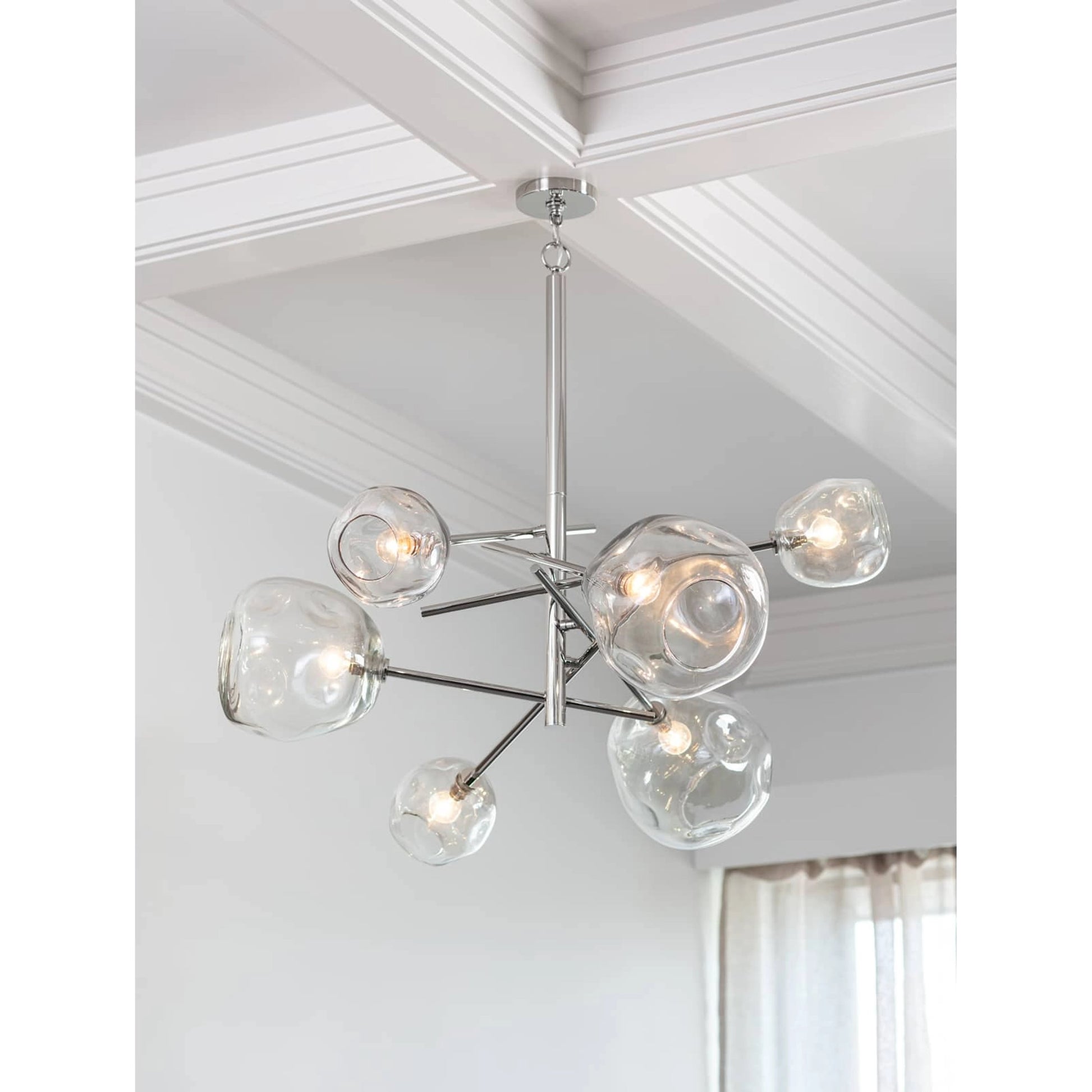 Molten Chandelier with Smoke Glass by Regina Andrew in nickel and polished nickel. Made from glass in a modern style.