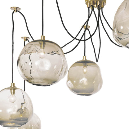 Molten Spider with Smoke Glass by Regina Andrew in brass and brass. Made from glass in a modern style.
