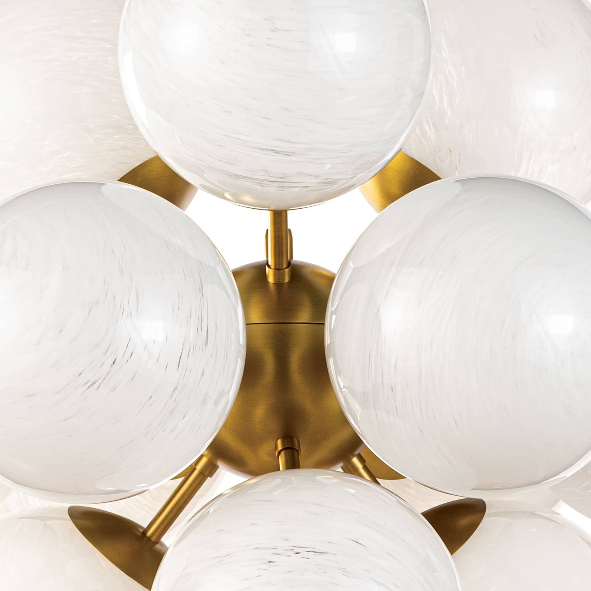 La Dame Chandelier by Regina Andrew in brass and natural brass. Made from steel in a modern style.