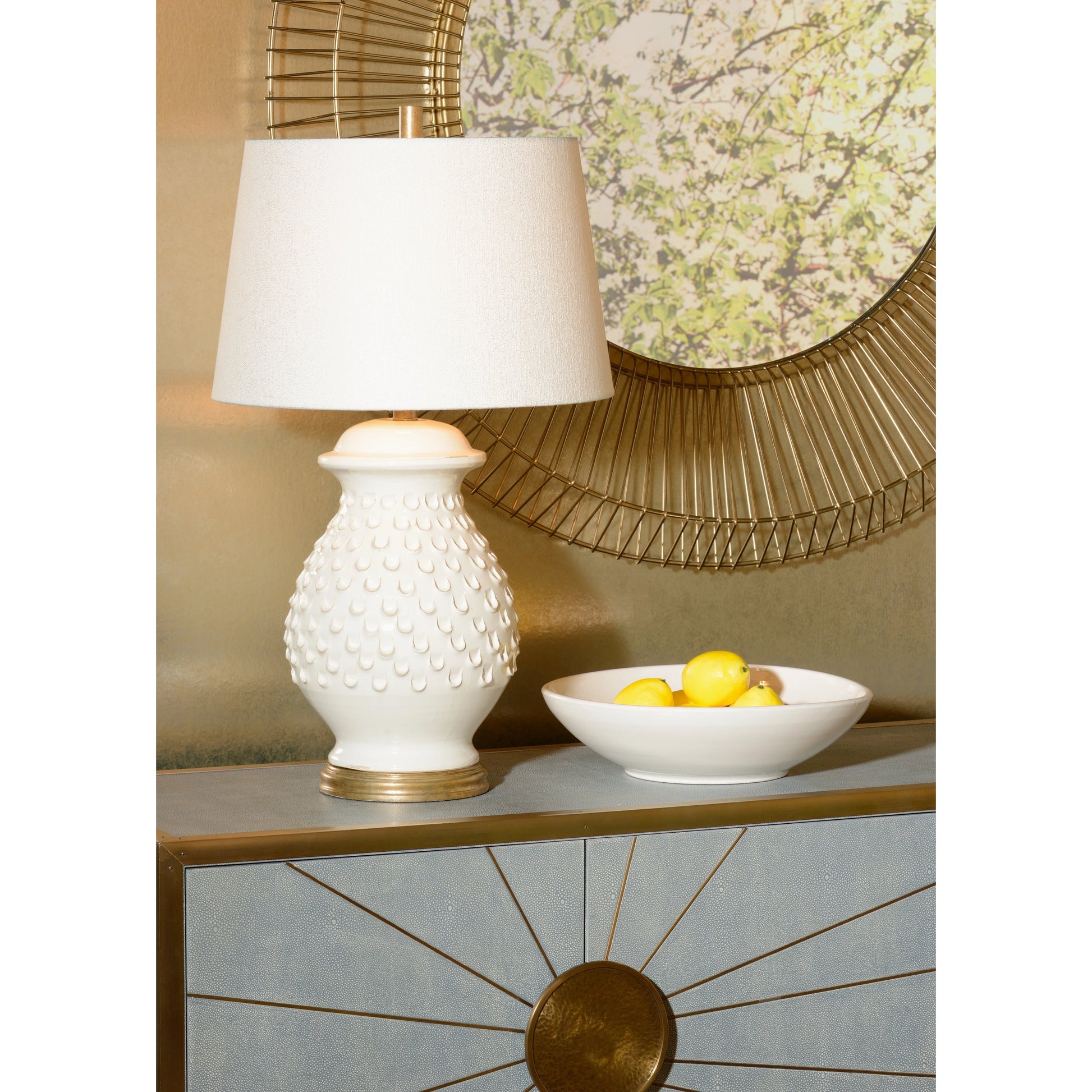 Fiera Lamp by Wildwood in hand sculpted, aged cream glaze, aged gold leaf. Made from ceramic, porcelain in a transitional style.