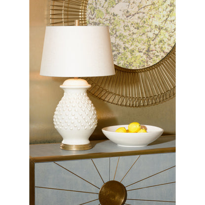 Fiera Lamp by Wildwood in hand sculpted, aged cream glaze, aged gold leaf. Made from ceramic, porcelain in a transitional style.