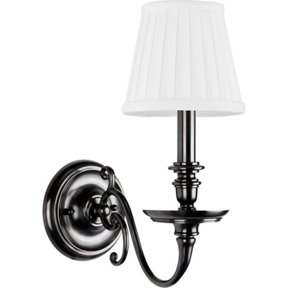 Charleston Wall Sconce by Hudson Valley in aged brass. Made from brass in a traditional style.