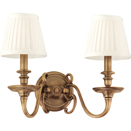 Charleston Wall Sconce by Hudson Valley in aged brass. Made from brass in a traditional style.
