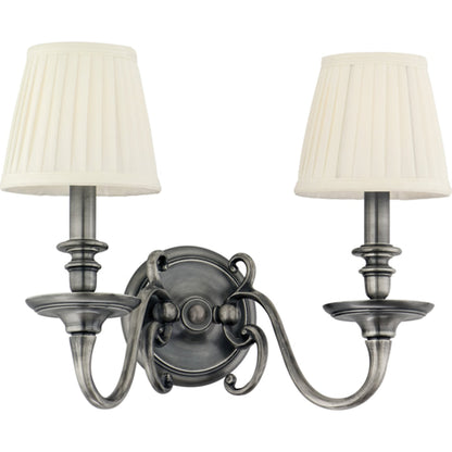 Charleston Wall Sconce by Hudson Valley in aged brass. Made from brass in a traditional style.