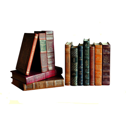 Rebound Leather Books by Sarreid Ltd. in multi and each book unique asst.colors sizes. Made from leather in a cottage & farmhouse style.