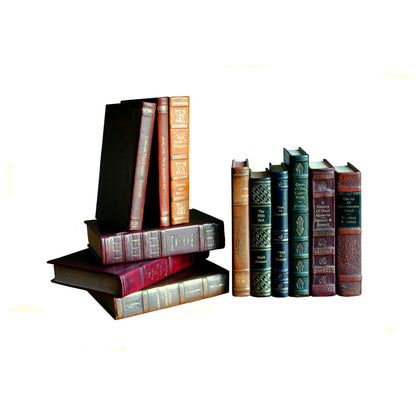 Rebound Leather Books by Sarreid Ltd. in multi and each book unique asst.colors sizes. Made from leather in a cottage & farmhouse style.