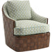 Nagano Swivel Chair by Tommy Bahama Home in brown. Made from rattan, fabric in a coastal style.