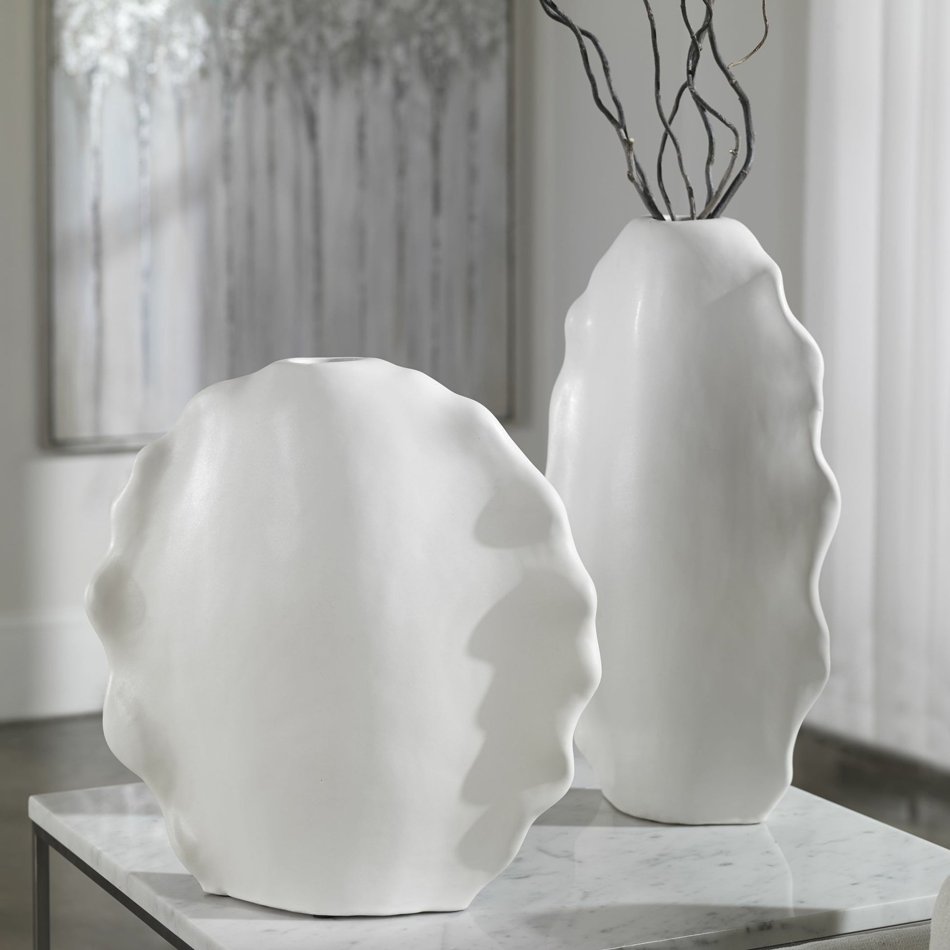 Ruffled Feathers Vases by Uttermost. Made from earthenware in a transitional style.