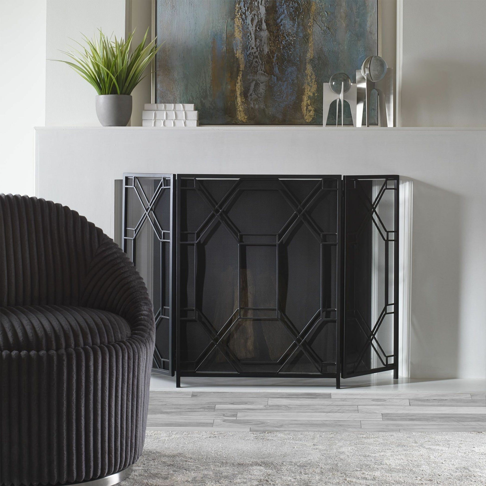 Rosen Fireplace Screen by Uttermost in gold. Made from metal in a traditional style.