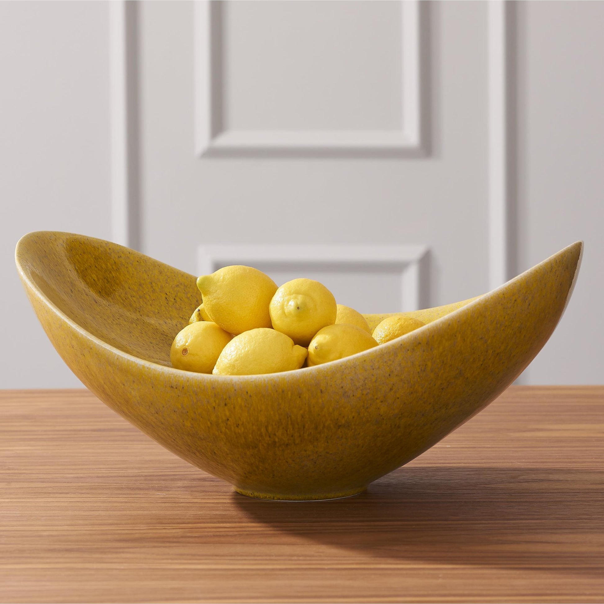 Swoop Bowl by Global Views. Made from ceramic in a modern style.
