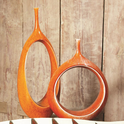 Open Ring Vase by Global Views. Made from ceramic in a eclectic & global style.