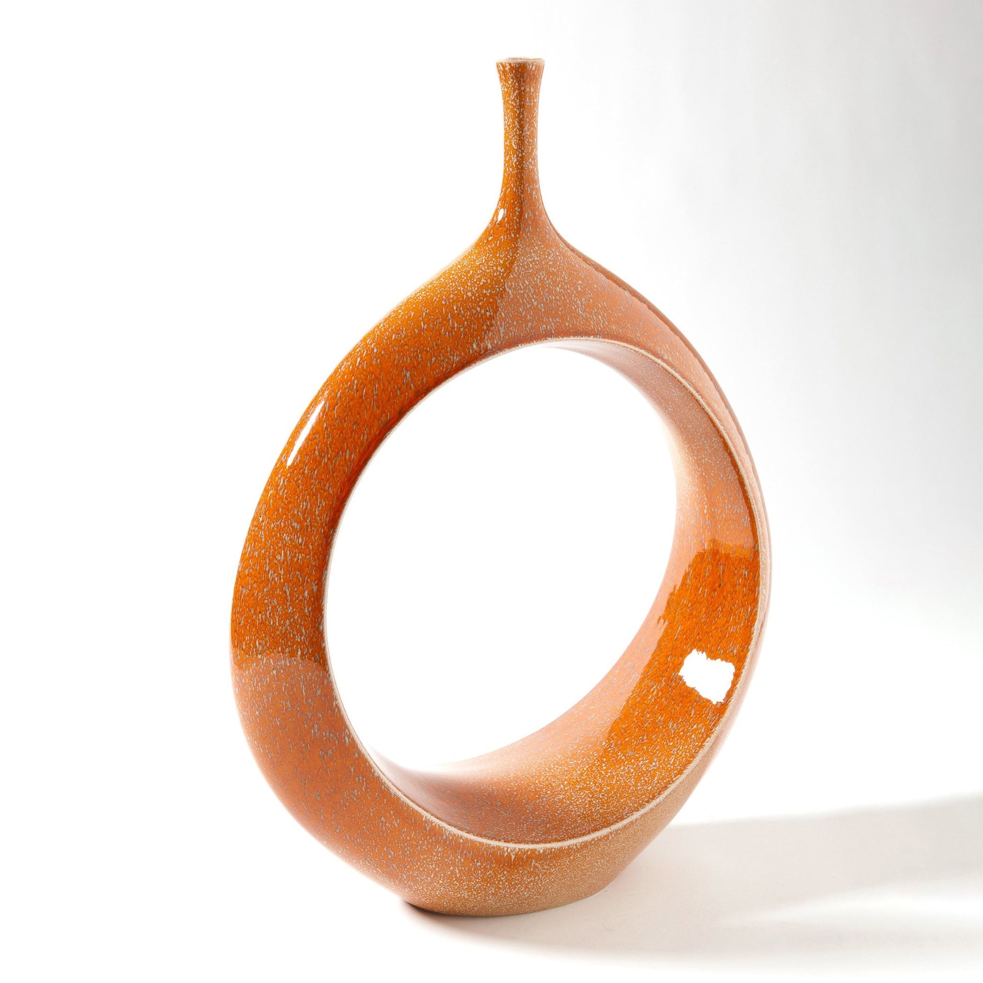 Open Ring Vase by Global Views. Made from ceramic in a eclectic & global style.