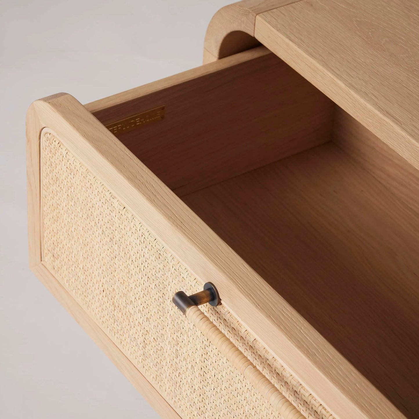 004 SI-2374578 | Closeup | Marsh Large Bedside Chest by Interlude Home in saddle, blonde, dark antique bronze. Made from oak, rattan, metal in a unique style.