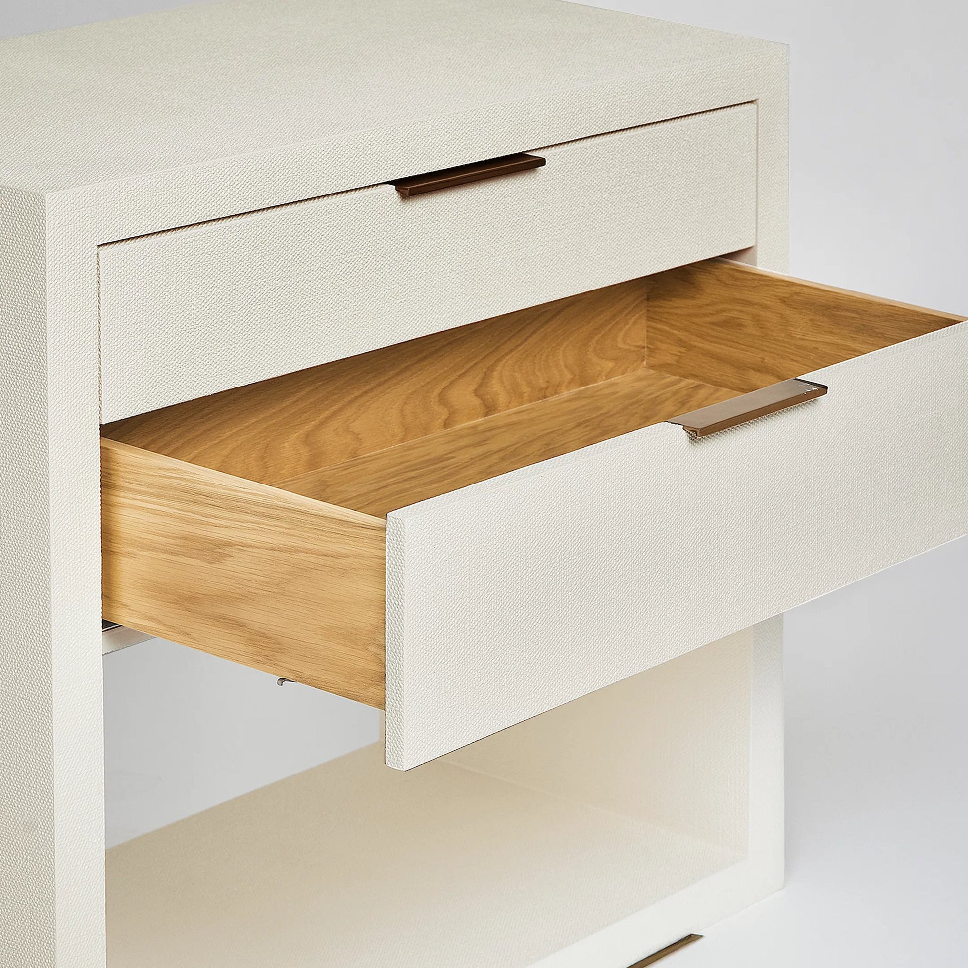 Montaigne Tall Bedside Chest by Interlude Home. Made from wood, faux linen, metal in a transitional style.