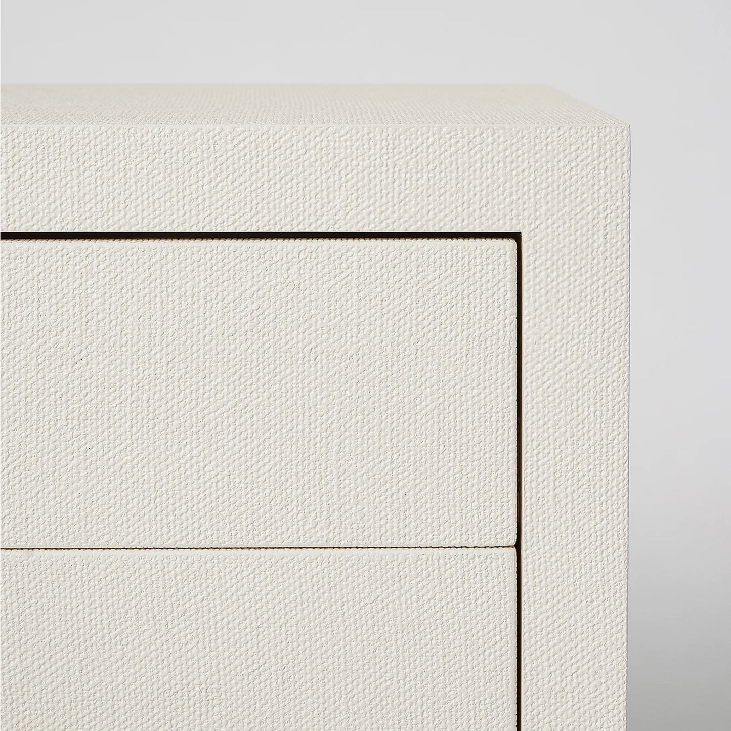 006 SI-2519610 | Closeup | Montaigne Tall Bedside Chest by Interlude Home. Made from wood, faux linen, metal in a transitional style.