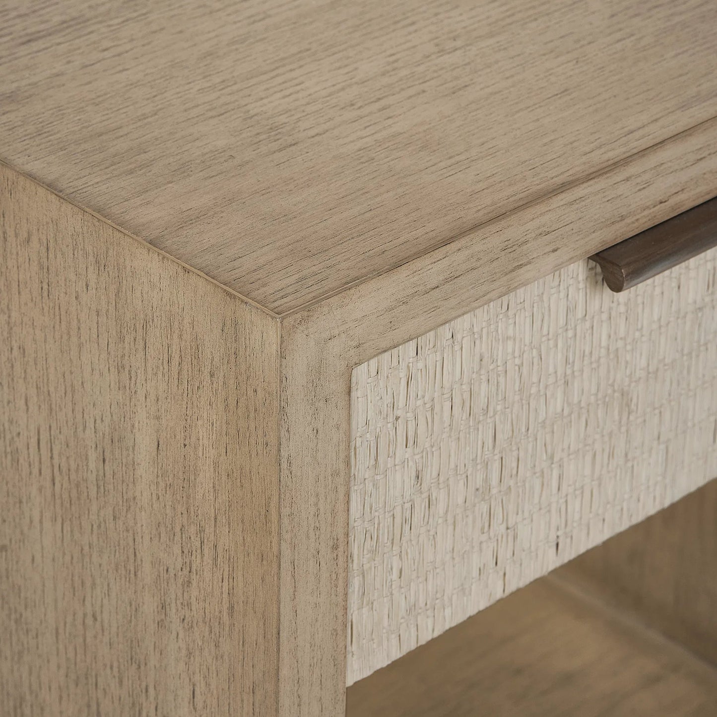 005 SI-2519588 | Closeup | Harperly Small Bedside Chest by Interlude Home in washed taupe, satin aged bronze. Made from sungkai wood, raffia, metal in a transitional style.