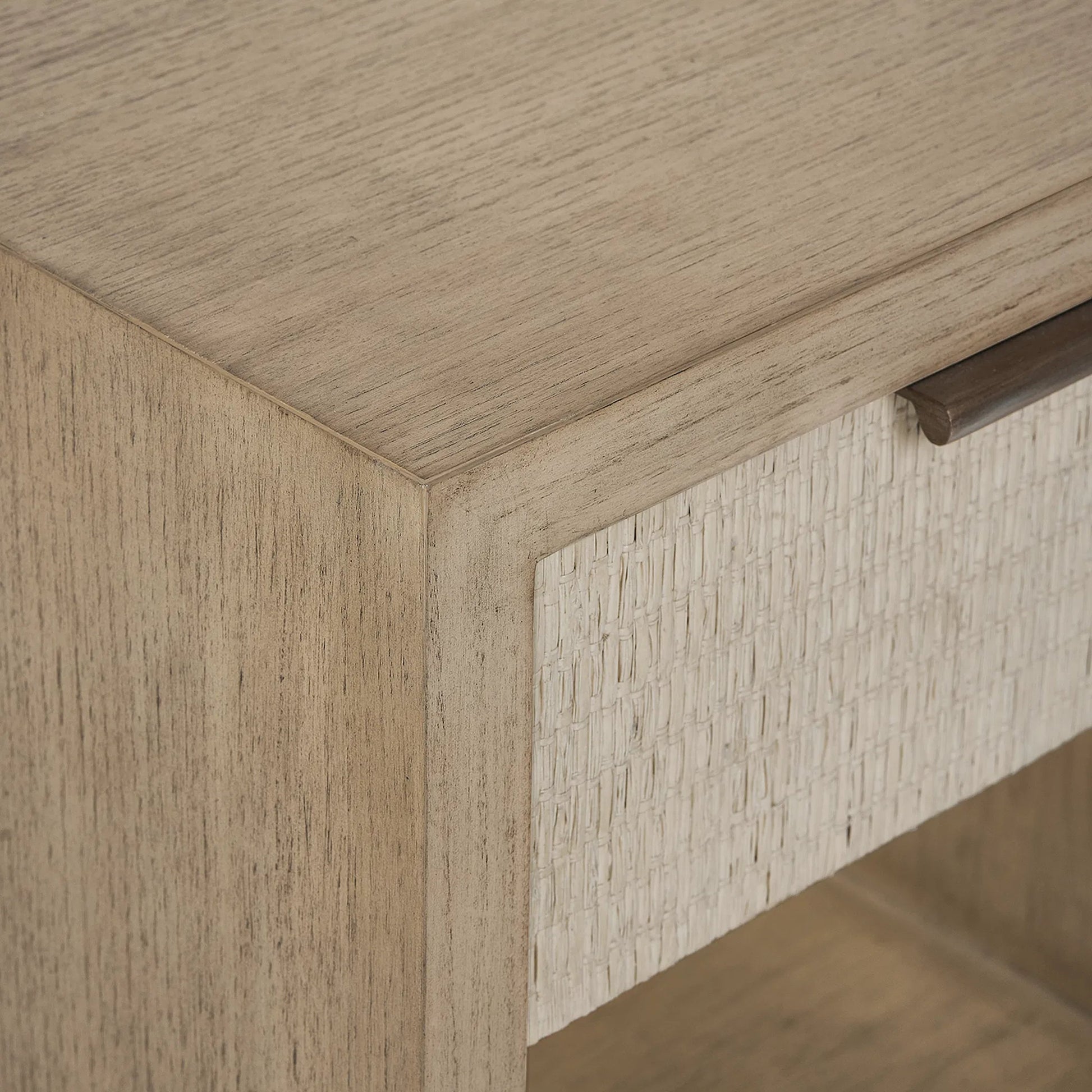 Harperly Small Bedside Chest by Interlude Home in washed taupe, satin aged bronze. Made from sungkai wood, raffia, metal in a transitional style.