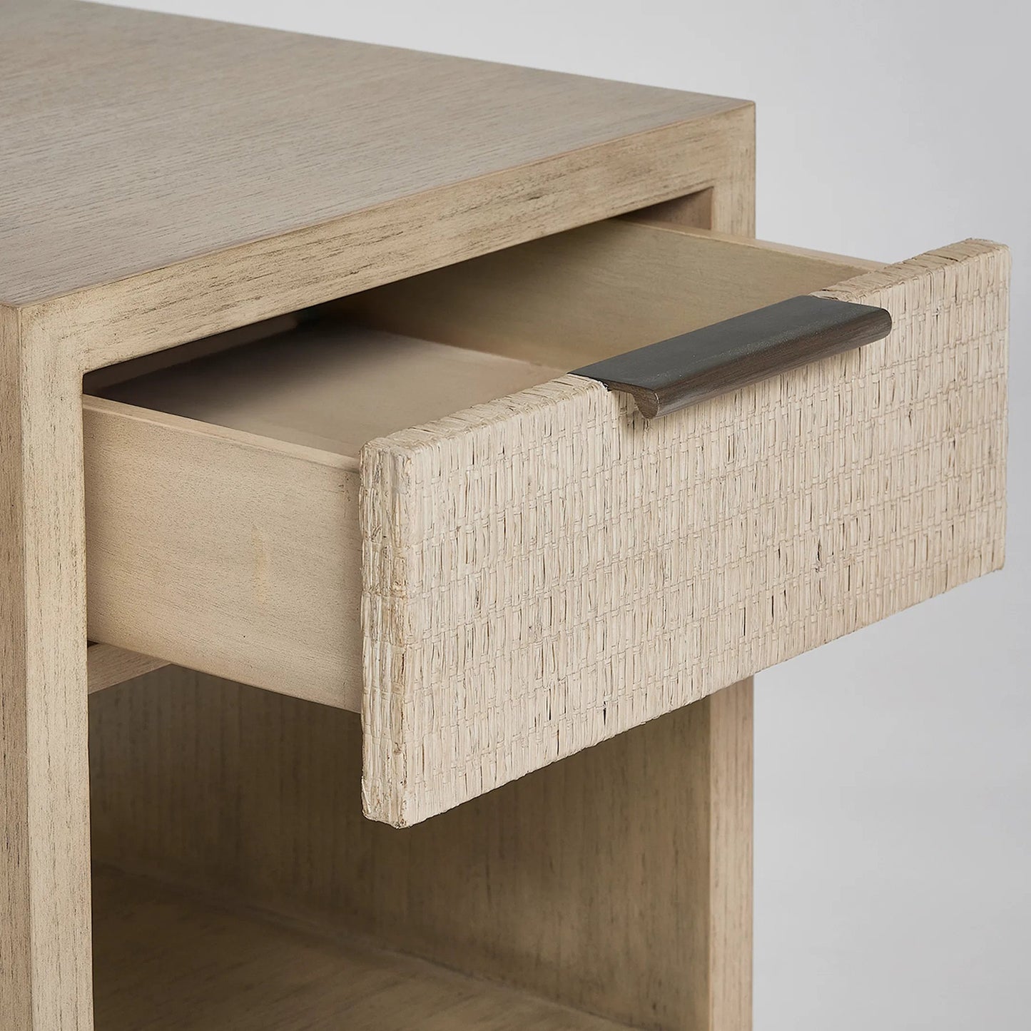 004 SI-2519588 | Closeup | Harperly Small Bedside Chest by Interlude Home in washed taupe, satin aged bronze. Made from sungkai wood, raffia, metal in a transitional style.