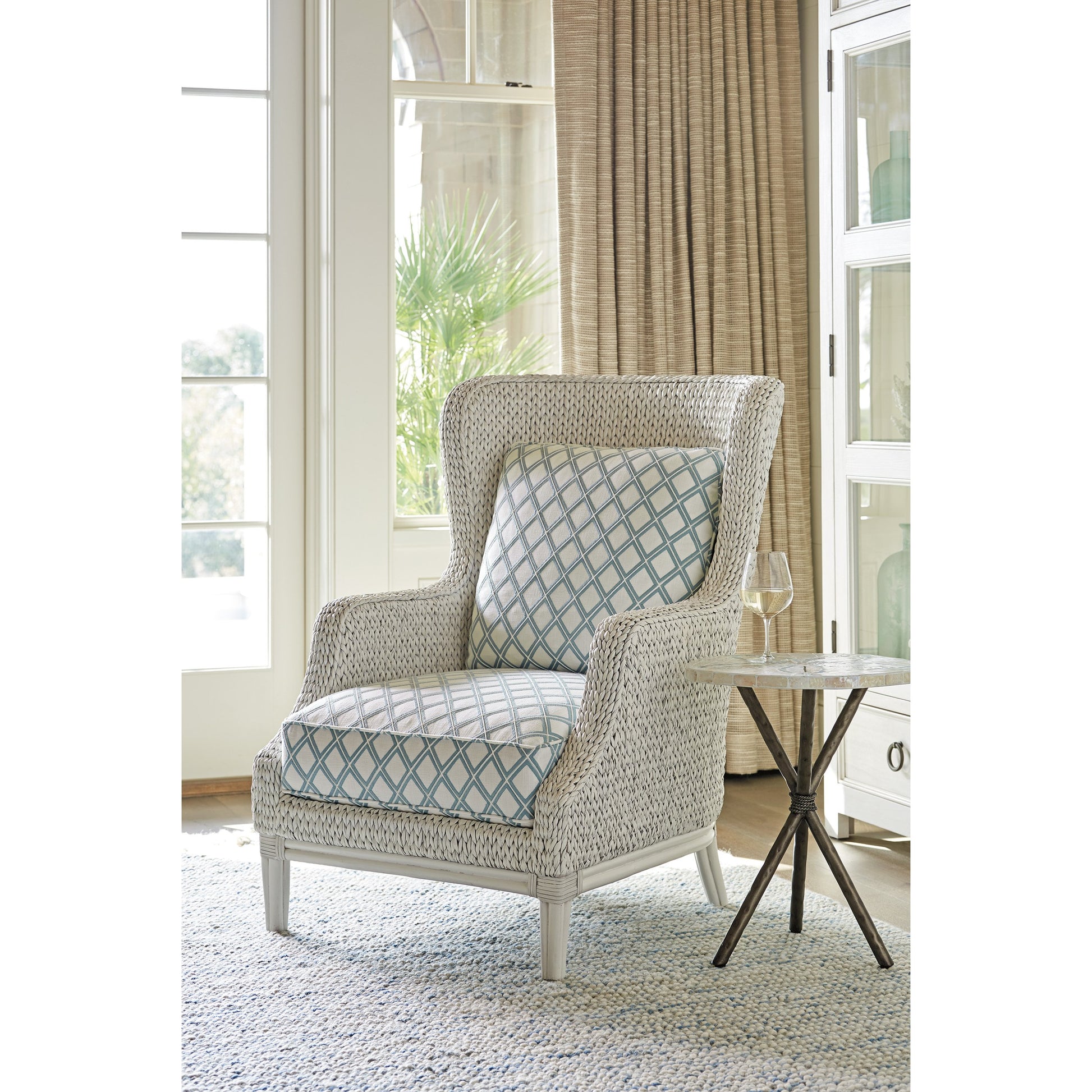 Vero Wing Chair by Tommy Bahama Home in blue mist and caribbean sands. Made from unique in a coastal style.