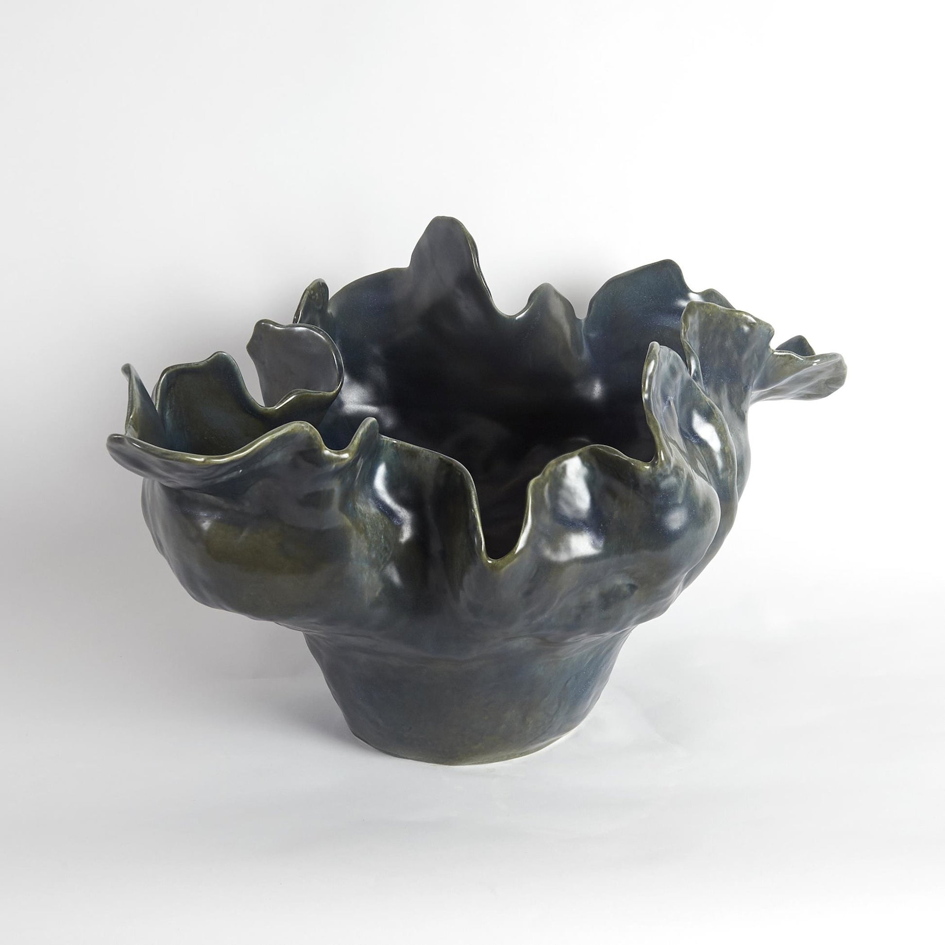 Meteor Bowl by Global Views. Made from ceramic in a coastal style.