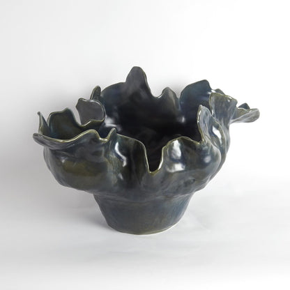 Meteor Bowl by Global Views. Made from ceramic in a coastal style.