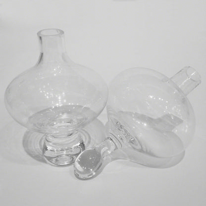 Mini Floating Footed Vase by Global Views. Made from glass in a modern style.