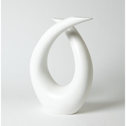 Loop Sculpture by Global Views. Made from ceramic in a modern style.