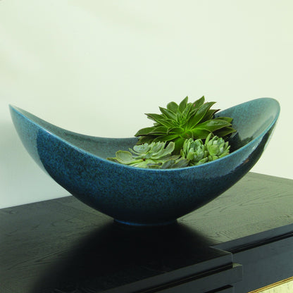 Swoop Bowl by Global Views. Made from ceramic in a modern style.
