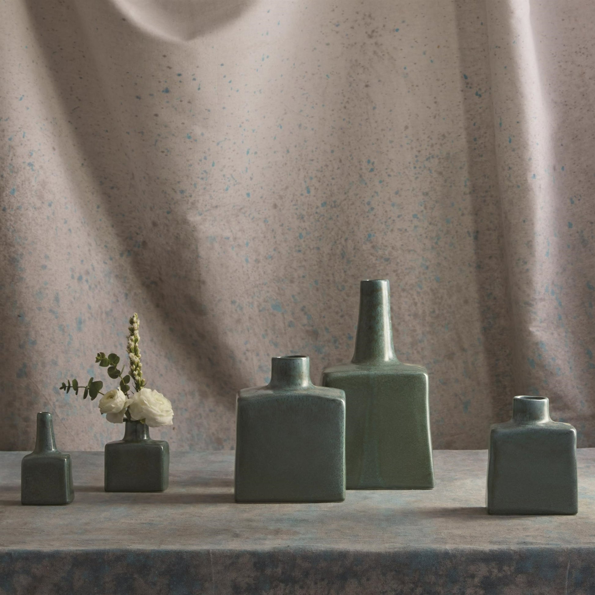 Tall Stack Bottle by Global Views in reactive ivory. Made from earthenware in a eclectic & global style.